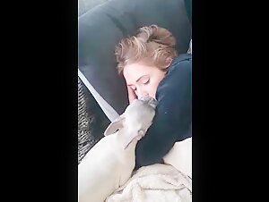 passed out while dog deep tongues her mouth